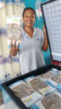 Ana showing the products they sell