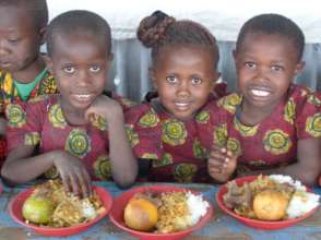Smiling girls during our weekly Kenya Heritage Day