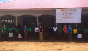 S.O.U.L. staff in front of the Community Center