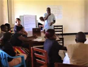 Jackson, Nyaka Founder & ED, leading a discussion