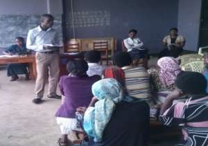 John presenting to community members