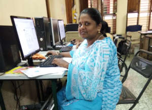 Aruna practicing her computer skills