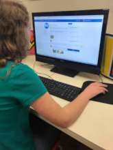 Clarkstown North student checking comments