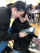 Reading a funny post from their partner classmate