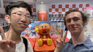 Nora (right) in Tokyo with a Summit Participant