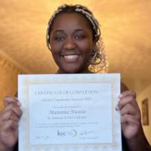 Photo of Participant with Summit Certificate