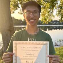 Photo of Participant with Summit Certificate
