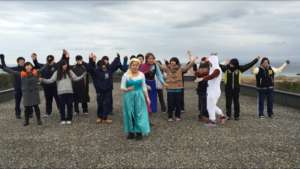 Students filming scene on the roof of their school