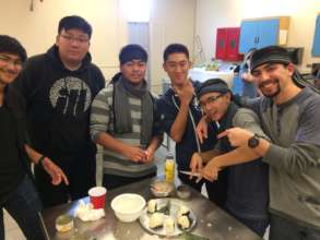 Working together to make some delicious onigiri