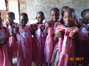 Children happy to get new school uniforms