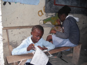 Students on a National Examinations, sharing desk