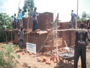 Donor help with first classroom construction 2014