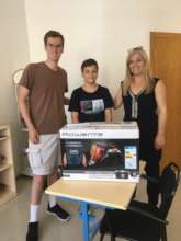 Donating a vacuum cleaner to the business
