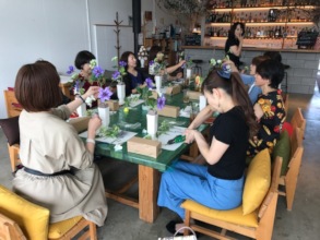 Creating flowers to the deceased.