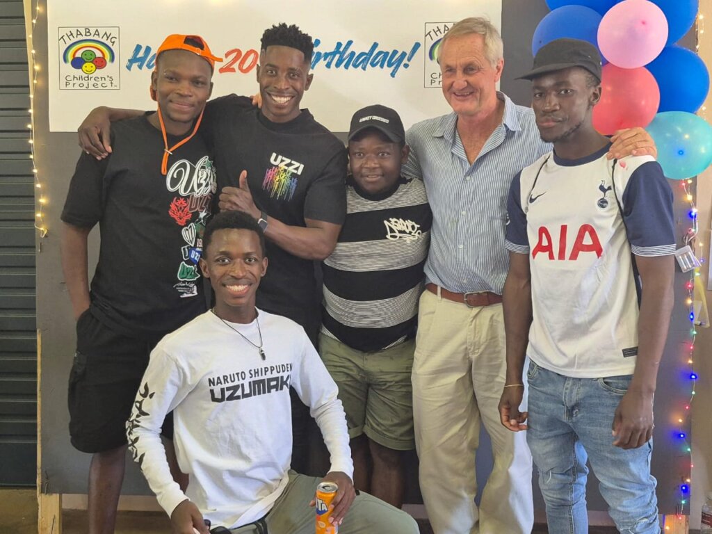 Former manager and older youth return to celebrate