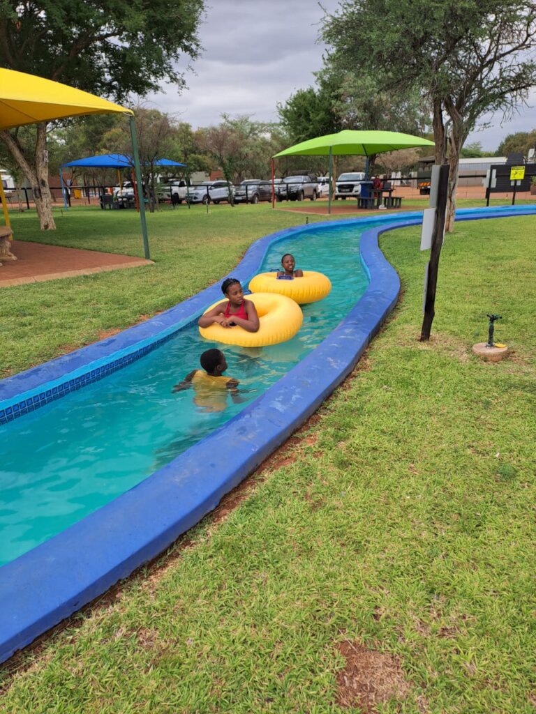 Drop-in centre children having fun in the water