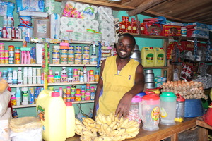 Muhire Azarias in his convenience store.