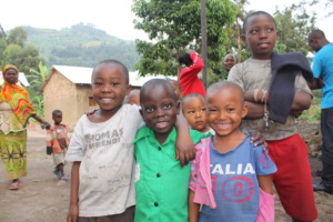 Mugisha (center) with some of his friends.