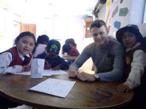 Students with volunteer John