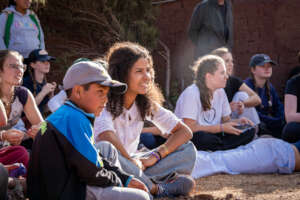 Volunteers from England sharing with students