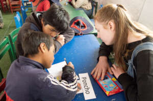 Volunteer helping the kids