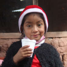 Enjoying hot chocolate at the Christmas party