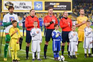 Children with the football stars