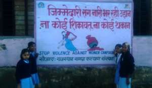 Students with Awareness Messaging wall painting