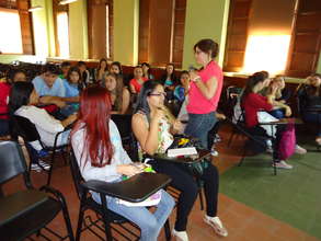 Dr Rugeles is leading a workshop with young people
