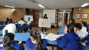 The facilitator and participants during a workshop