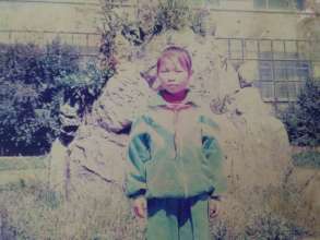 Xiaoli in childhood