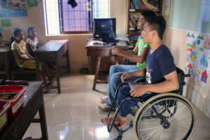 Socheat and Teuly deliver an arts class