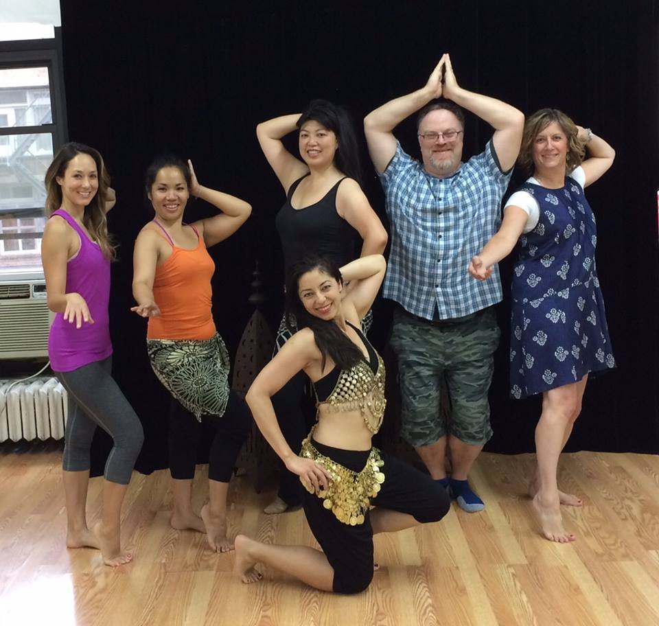 Volunteer Peter Taghe belly dances for Bolivia