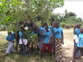 Club P.A.N. children planting trees