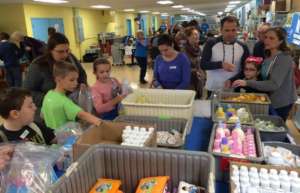 Families packing newborn supplies