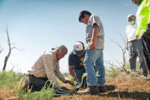 3 generations of Calabaza family planting trees