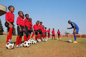 Children line up for Warm Up at Soweto HA