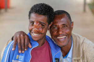 Geremew with his father before his operation