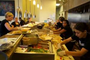 Food prep at Homegirl Cafe