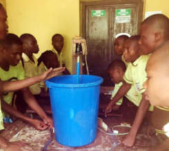 Students construct a locally made soap mixer