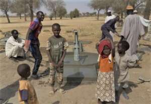 Happy faces excited at the prospect of clean water