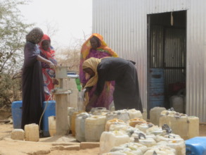 Women fill their water cans
