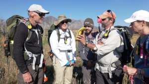 Earthwatch volunteers learn to use a mapping tool
