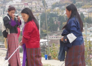 A participant taking background shots.