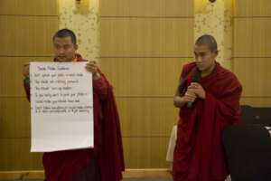 A monk presents his group's social media guideline