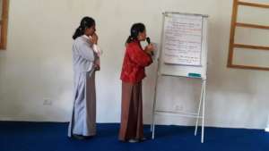 Students present their projects in the summit.