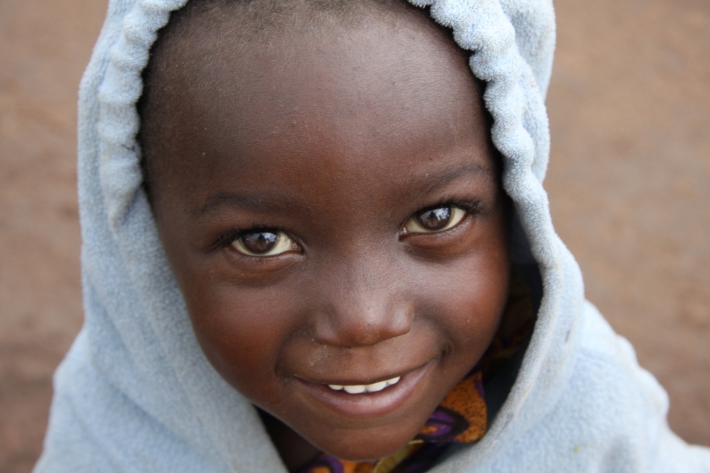 Warm clothes for this little kid. your donation continues to off