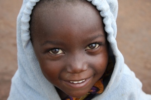 Warm clothes for this little kid. your donation continues to off