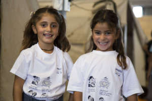 Children wear shirts that teach them hygiene tips