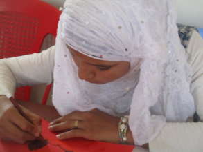 Dana works on a poem in a Temporary Learning Space